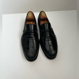 Tod's Elegant Black Leather Slip-Ons